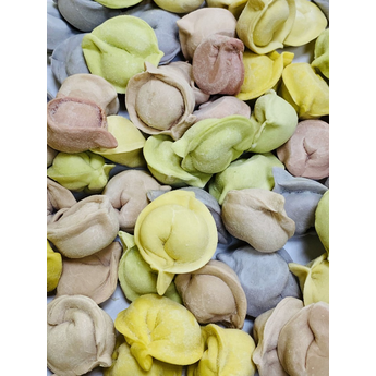 Mini dumplings colored of chicken